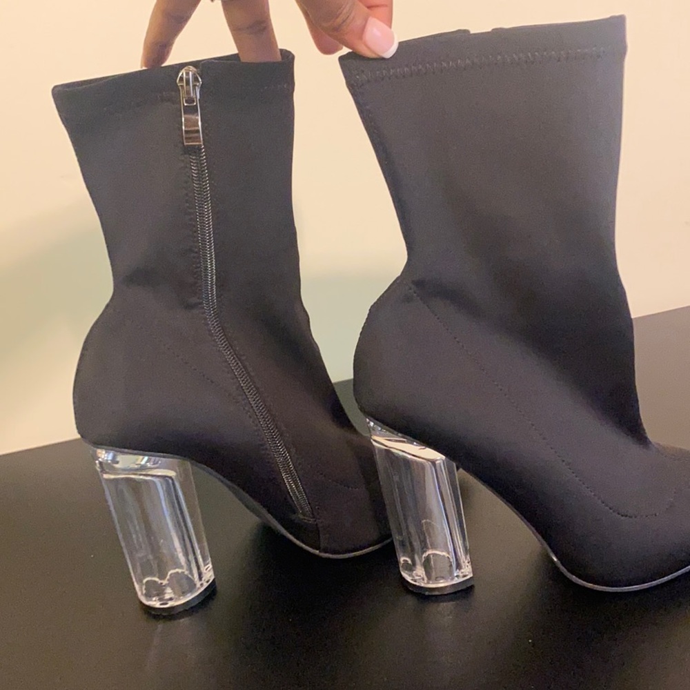 Black bootie glass heel.